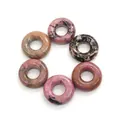 Gepolijste natuurstenen donutkralen in roze voor het maken van unieke DIY sieraden - Rhodoniet