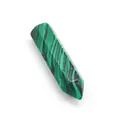 Dettaglio del cristallo di malachite con motivi a strisce verdi e nere e bordi lucidi - Malachite