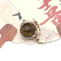 Golden dragon claw pendant holding a brown tiger eye stone ball for DIY jewelry - Tiger's Eye