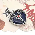 Silver dragon heart pendant with blue lapis lazuli stone and red zircon eye detail - Lapis Lazuli / 32x41mm