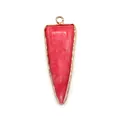 Macro detail of a triangular pink stone pendant with a polished gold metallic border - Pink Stone(2)