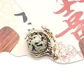 Golden dragon claw pendant featuring a round white dalmatian stone for jewelry making - Dalmatian Jasper