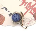 Blue natural stone ball pendant held by a golden dragon claw fitting for DIY jewelry - Blue Spot Stone