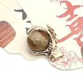 Golden dragon claw pendant featuring a round brown stone bead for DIY jewelry making - Jasper
