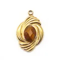 Macro detail of gold geometric vortex pendant with faceted brown tiger eye stone - 15x23mm (ai-1 Piece/Pack) / Tiger's Eye