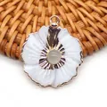Flower shaped pendant with natural white shell petals and gold plating detail - White Crystal