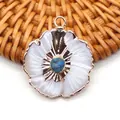 Flower-shaped freshwater shell pendant with turquoise center in gold plating - Blue Crazy Agate