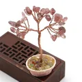 Árbol de cristal rosa con ramas de cobre tejidas en una maceta decorativa de flores - Cuarzo Fresa
