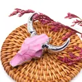 Detailed view of pink resin bull skull pendant with silver plated metal edges and loop - Pink Textured Gem-Look Silver Horn Style (Size 5)