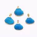 Set of four bright blue scallop shell pendants with gold plated edges and nautical style - Bright Blue