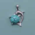 Polished silver dolphin pendant featuring a natural blue turquoise stone inlay - Blue Turquoise