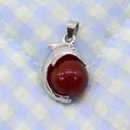 Silver dolphin pendant with a round reddish-brown natural stone bead for necklaces - 14x23mm / Red Agate