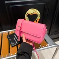 Chic pink patent leather small square handbag with thick gold irregular metal handle - Pink