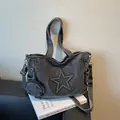 Vintage gray denim tote bag with star embossing and adjustable long shoulder strap - Black