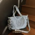 Blue denim tote bag with star quilting, adjustable strap and round coin purse accessory - Light Blue