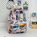 Mini backpack with colorful canvas patchwork and fringe design on a white desk - No Pendant / Yellow and Red