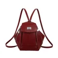 Chic burgundy PU leather backpack with silver hardware and sleek minimalist design - Red