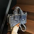 Blue washed denim moto bag with vintage hardware and functional multi-pockets - Denim Blue