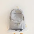 Minimalistischer hellgrauer wasserdichter Oxford-Rucksack mit Logo-Patch und Seitentaschen - Grau