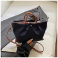 Donkerblauwe geplooide nylon shopper met bruine lederen handvatten en schouderriem - Donkerblauw Klein