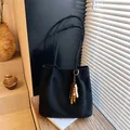 Retro black suede tote bag with decorative wooden bead tassel and long shoulder straps - Single Bag / Black