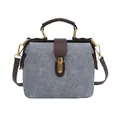 Vintage denim blue doctor bag with brown leather handles and golden metal hardware - Blue Without Charm