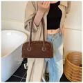 Brown suede baguette shoulder bag with white stitching and large capacity for commuting - Coffee