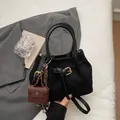 Vintage black matte bucket bag with gold buckle, scarf detail and mini pendant - No Pendant / Black