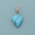 Lapis lazuli shield pendant with faceted natural stone and golden beaded bail detail - Blue Turquoise