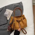 Retro matte caramel bucket bag with pleated details and matching mini charm pouch - No Pendant / Brown