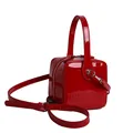 Stylish glossy red patent leather box-shaped handbag with adjustable crossbody strap - Red