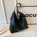 Minimalist black leather tote bag with matte wrinkled texture and wide shoulder strap - Black (sh-e-2398)