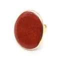 Macro detail of oval Red Jasper stone featuring natural textures on a golden open ring band - 18.00g / Adjustable / Red Jasper