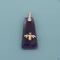 Trapezoid purple crystal pendant with golden bee detail and stone bale - Purple Crystal