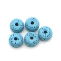 Macro view of five sky blue porous lava stone beads for jewelry DIY projects - Style 2 (Sky Blue)