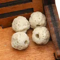 Set of four cream porous lava stone beads for DIY jewelry making on wooden background - No.13 (Cream)