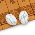 Ovale witte turquoise halfedelsteen met zwarte marmeren nerven voor sieraden maken - Wit Howliet Armband
