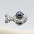 Macro shot of silver flower pendant with dark pearl and sparkling cubic zirconia pavé - Black Pearl Rhombus Style (1014-B250606028)