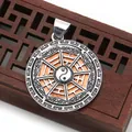 Detailed close-up of retro silver Tai Chi Yin Yang shell pendant on wooden stand - Brown (No. 2)