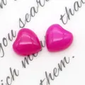 Coppia di cabochon in resina fucsia lucida a forma di cuore per creazione di gioielli - Calcedonio Rosa Rosso