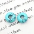Twee turquoise kralen met zwart webpatroon voor doe-het-zelf sieraden en kettingen - Blauwe ader turkoois