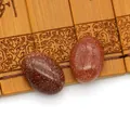 Gepolijste ovale Goldstone cabochons in bruin en roodbruin voor DIY-sieraden maken - Goudzandsteen