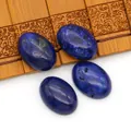 Set van vier ovale Lapis Lazuli cabochons in diepblauw met gouden pyriet spikkels - Synthetisch Lapis Lazuli