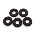Macro detail of five black lava stone donut pendants with natural porous texture for DIY - 33mm