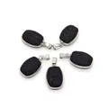 Five-piece set of oval black lava rock pendants with silver metal frames and top hooks - 16x26mm / Barrel Shape