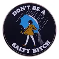Funny enamel pin badge featuring a girl with umbrella and Don't Be A Salty Bitch text - Black