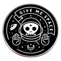 Astronaut skull metal badge featuring GIVE ME SPACE slogan and cosmic star elements - Give Me Space