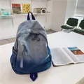 Blauer Denim Rucksack mit Farbverlauf, Canvas-Stoff und vorderer Reißverschlusstasche - Blau