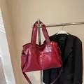 Large burgundy tote bag in premium faux leather with dual handles and long shoulder strap - 39/25/15cm / Burgundy