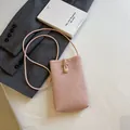 Mini light pink woven crossbody mobile phone bag with decorative pearl buckle detail - Pink with White Buckle